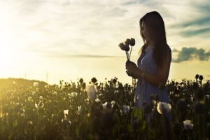 girl with flowers in mediation